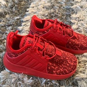 Red Adidas sneakers